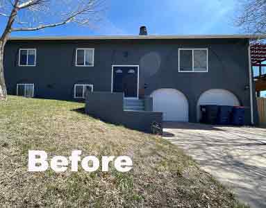 The before picture of this home shows rounded garage doors and a severe stone entrance