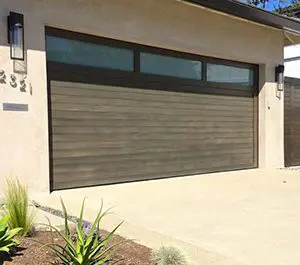 This style of garage doors is mid-century modern with its skinny rectangular windows.